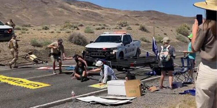 Climate activists do their best to irritate drivers but Nevada tribal police weren’t having it