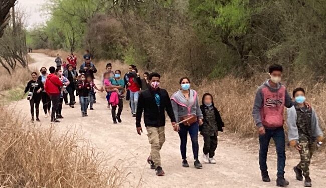 Lines of Shackled Illegals Seen Boarding Military Aircraft for One-Way Trips Home – RedState