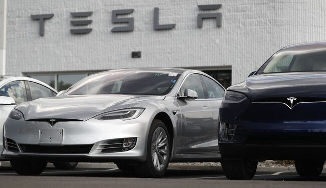 NYC ‘Takedown’ Protesters Flaunt Disturbing Signs About Violence to Teslas – RedState